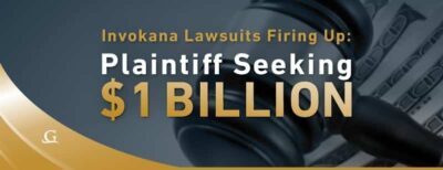 Wooden Gavel Laying On Top Of A Stack Of Money Stock Photo