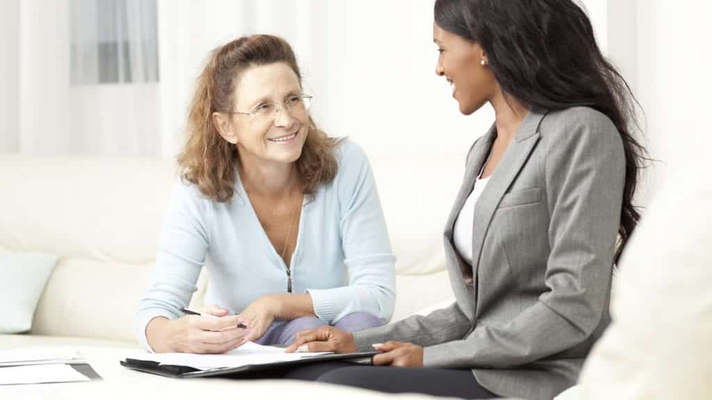 Lawyer Meeting With A Client Privately Stock Photo