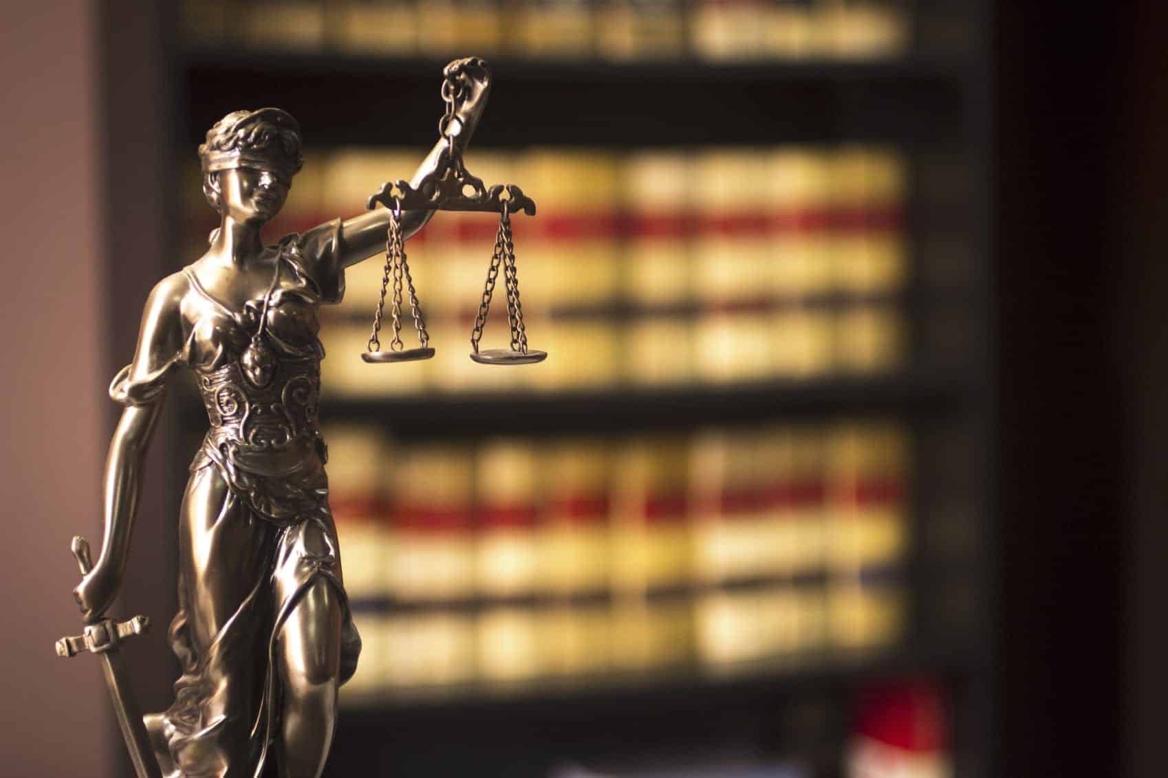 Lady Justice Holding Scales Stock Photo