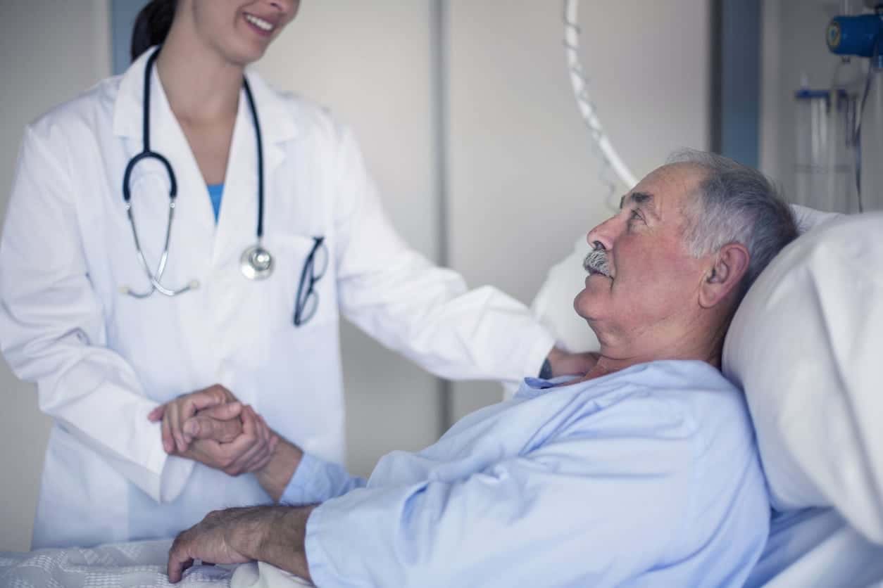 Doctor taking care about a senior man in the hospital