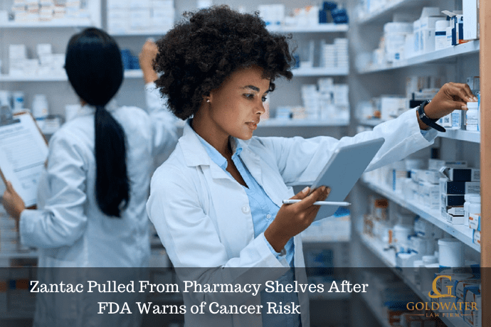 Female Pharmacist Examining Medication Bottles Stock Photo