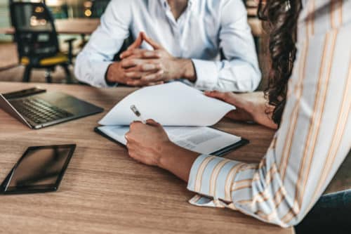 a Phoenix, AZ, lawyer reviewing the details of a personal injury case